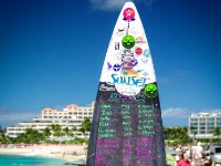 Outside the  Sunset Beach Bar  there&#39;s a surfboard where they chalk up the days arrivals. You can see the KLM flight (which will be a 747) in at 12:15 and our beloved WestJet arriving at 3:50. It&#39;s a nice touch I think.